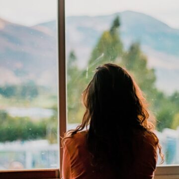 women looking out of window
